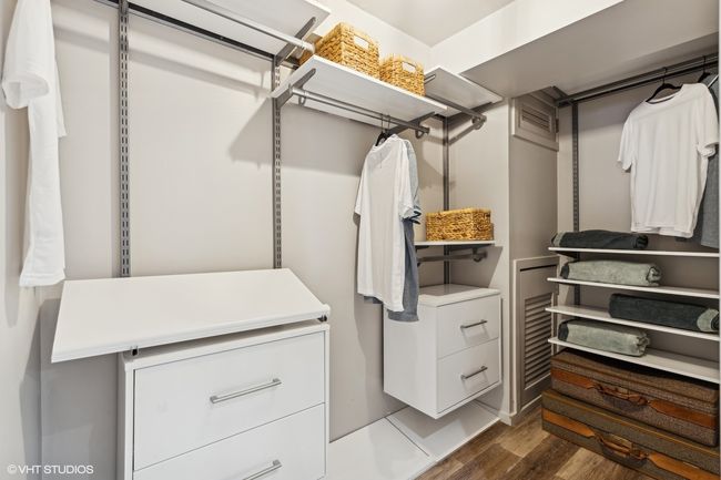 Primary suite walk-in closet and dressing room | Image 26