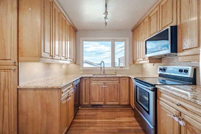 8408 Addison Dr Se, House other with 4 bedrooms, 2 bathrooms and 3 parking in Calgary AB | Image 8