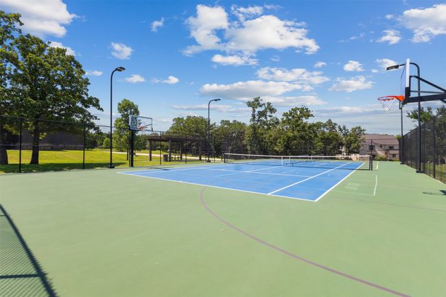 View of tennis court featuring community basketball court | Image 17