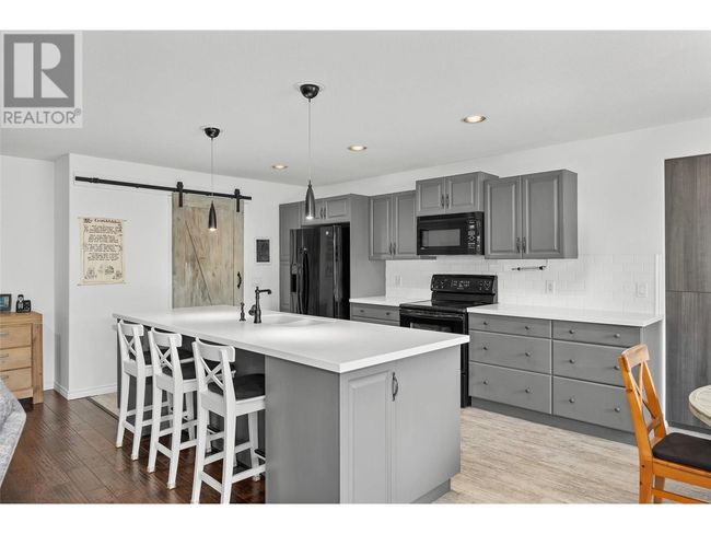 1503 Tanemura Cres, House other with 6 bedrooms, 4 bathrooms and 4 parking in Kelowna BC | Image 9