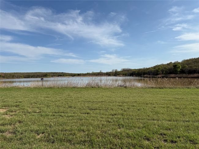 View of yard with a water view | Image 22