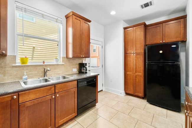 You will find that this kitchen has great storage space | Image 10