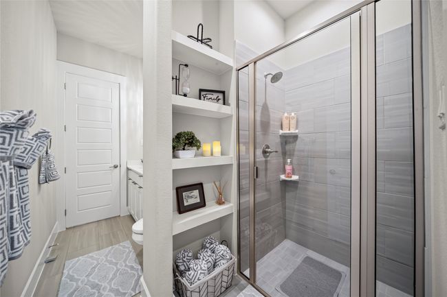 Full bathroom featuring a stall shower, vanity, and built in features | Image 23
