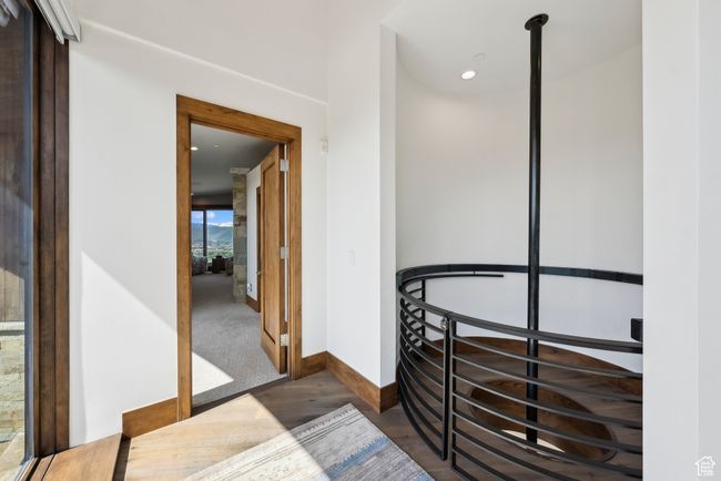 Hallway featuring baseboards, wood finished floors, and recessed lighting | Image 41