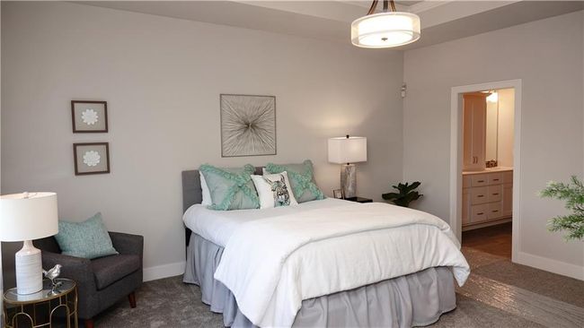 Bedroom with baseboards and ensuite bathroom | Image 29