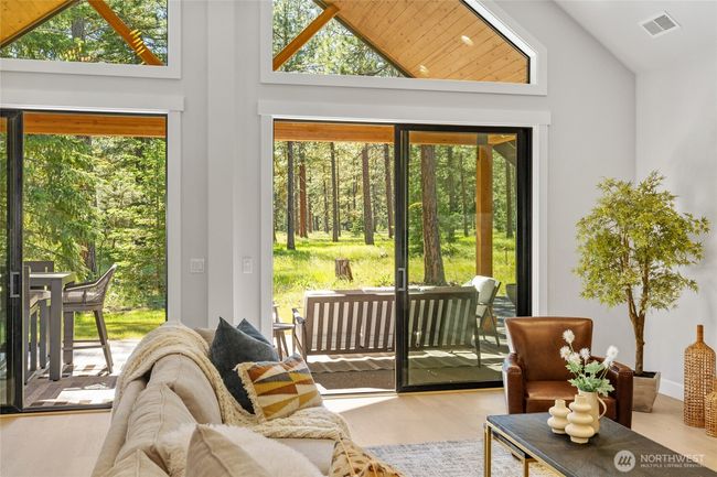 Views to outside covered back patio. | Image 17