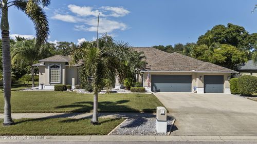 874 Woodbine Dr, Merritt Island, FL, 32952-4147 | Card Image