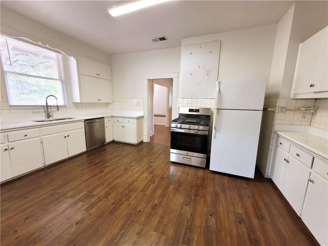 New countertops, LED Lighting, and stainless dishwasher and Gas Range | Image 6
