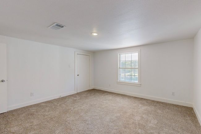 Spare room featuring carpet | Image 28