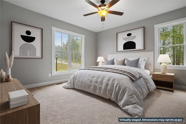 Unfurnished bedroom featuring carpet flooring and ceiling fan | Image 11