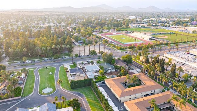 Bird’s-eye views show lot depth, neighborhood proximity, and scale of both main and guest structures. | Image 59