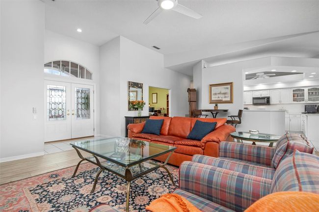 Great room, foyer, den, kitchen | Image 9