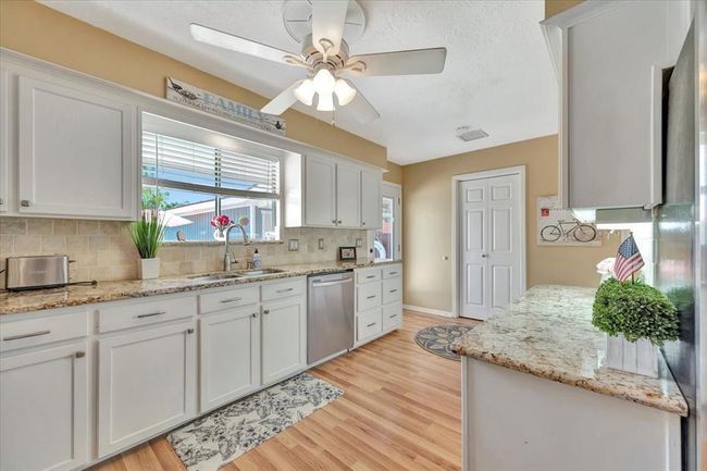 Another view of the kitchen. | Image 21