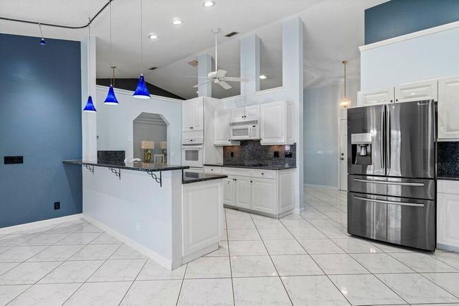 61 W Rubber Tree Dr, House other with 3 bedrooms, 2 bathrooms and null parking in Lake Worth FL | Image 10