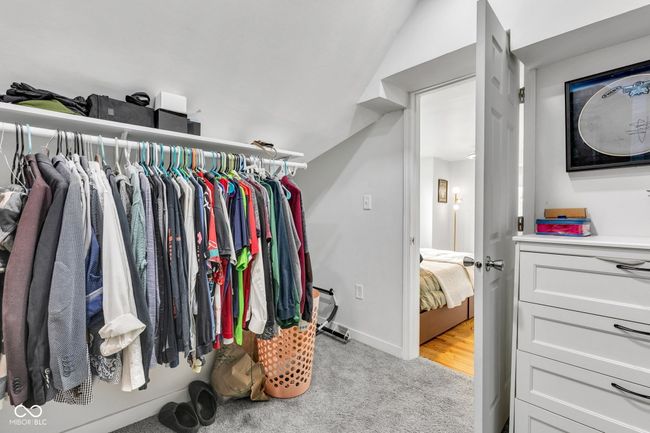 Primary Suite walk in carpeted closet with room for two wardrobes! | Image 28