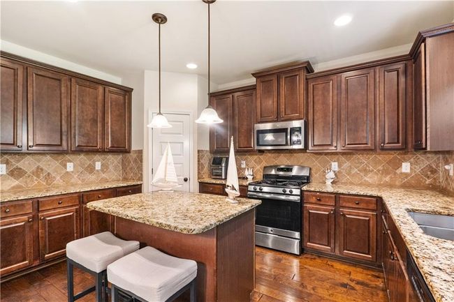 7946 White Oak Loop, House other with 5 bedrooms, 4 bathrooms and 2 parking in Stonecrest GA | Image 7