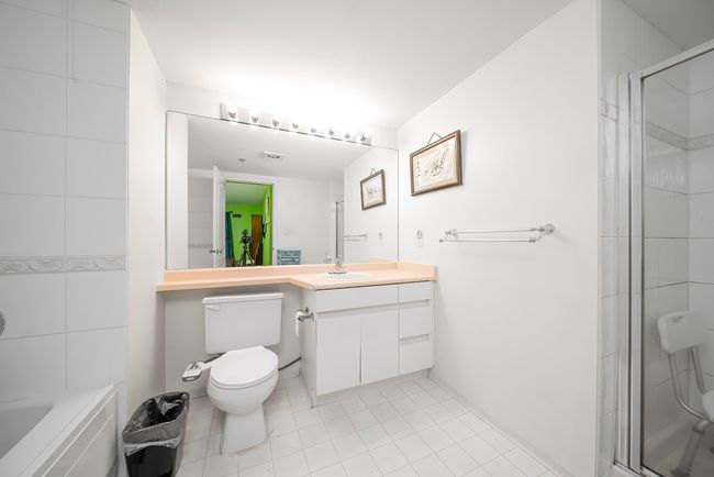 Full bathroom with toilet, vanity, and tile patterned flooring | Image 15