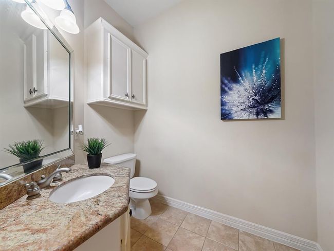 Stylish first-floor half bath with elegant finishes! | Image 13