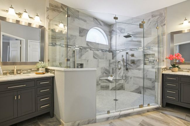 Immaculately maintained bathrooms with modern updates throughout. | Image 6