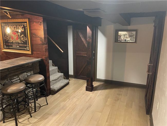 stairway landing in basement | Image 32