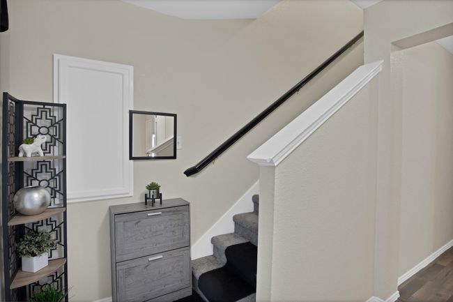 Stairway with baseboards and wood finished floors | Image 17