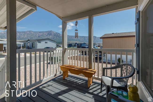 Balcony with a mountain view and a residential view | Image 5