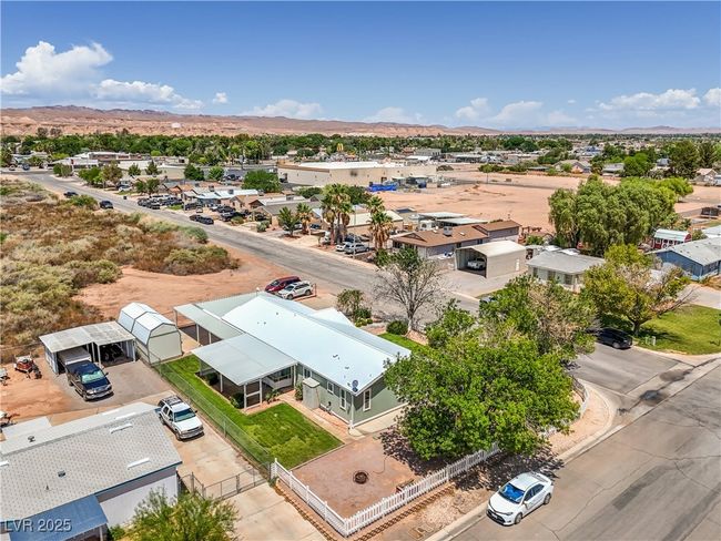Aerial view of residential area featuring mountains | Image 38