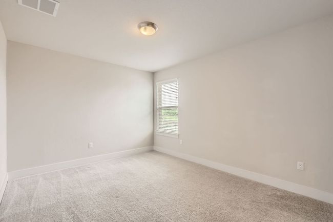 Unfurnished room featuring light carpet | Image 24