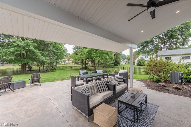 View of terrace featuring outdoor lounge area and ceiling fan | Image 48
