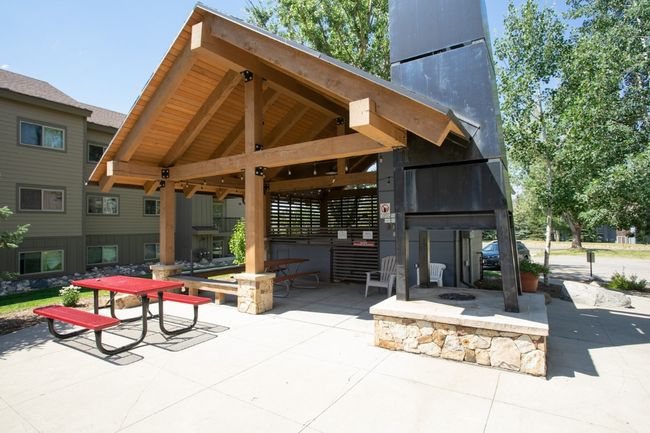 Communtiy Picnic Area and Hot Tub near the entry of the unit | Image 4