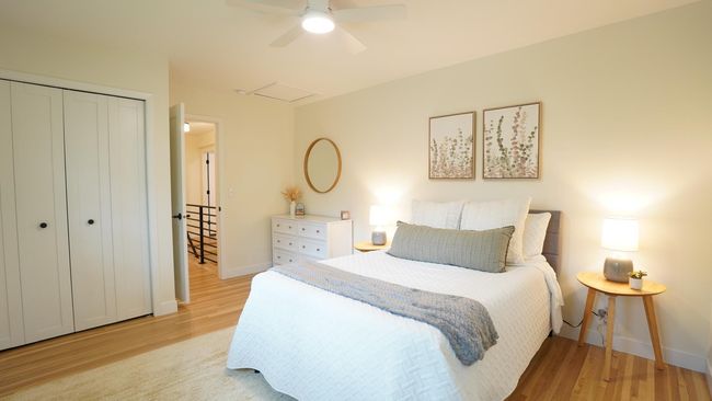 The second bedroom offers a large closet, convenient access to the hall bath and a brand new ceiling fan. | Image 26