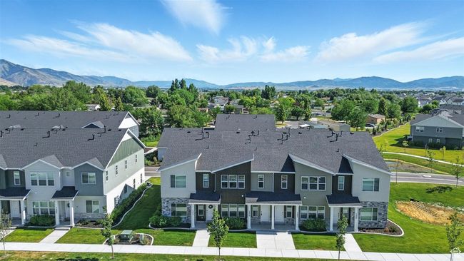 Aerial view of residential area with a mountain backdrop | Image 32