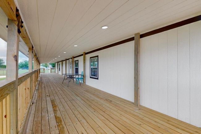 View of HUGE side by side patio/deck | Image 31