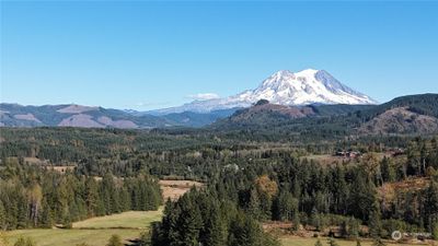 ***THIS IS NOT THE ACTUAL VIEW*** But there's potential for mountain views if you remove some timber. | Image 2