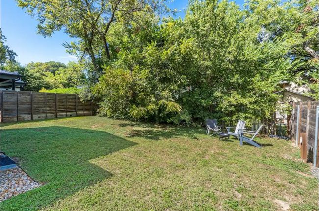 View of fenced backyard | Image 24