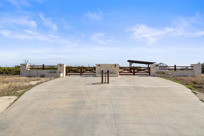 View of community featuring fence and a gate | Image 33