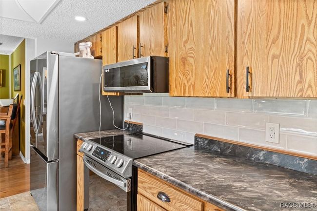 7618 W Golf Club St, House other with 3 bedrooms, 2 bathrooms and 2 parking in Crystal River FL | Image 11