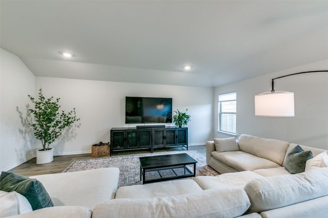 Living room with wood-type flooring | Image 7