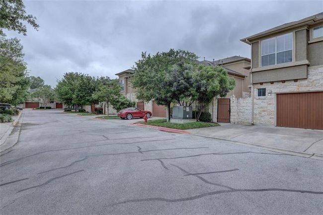 VIEW OF COMPLEX DRIVEWAY | Image 22
