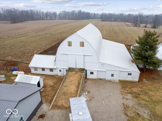Vintage Sears and Roebuck barn with hayloft in the upper level and stalls and storage in lower level. Pasture area connected to the back. | Image 41