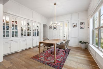 Beautiful formal dining right as you enter the front door. | Image 2