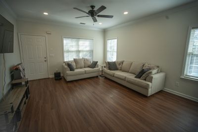 View from the Kitchen back towards the front door. Luxury Vinyl flooring, tons of natural light. | Image 3