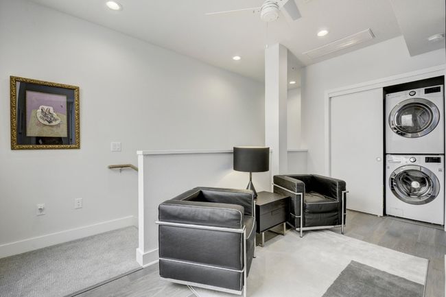 Sitting room with washer/dryer & storage closet. | Image 13
