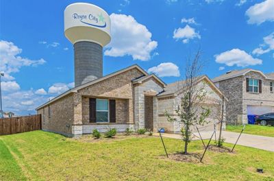 View of front of property featuring a front yard and a garage | Image 2