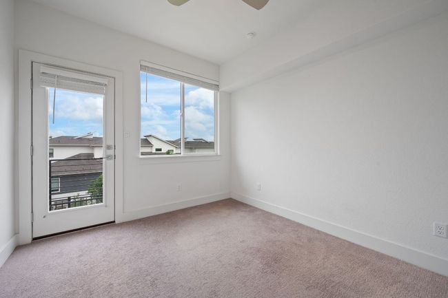Empty room with carpet and a ceiling fan | Image 18