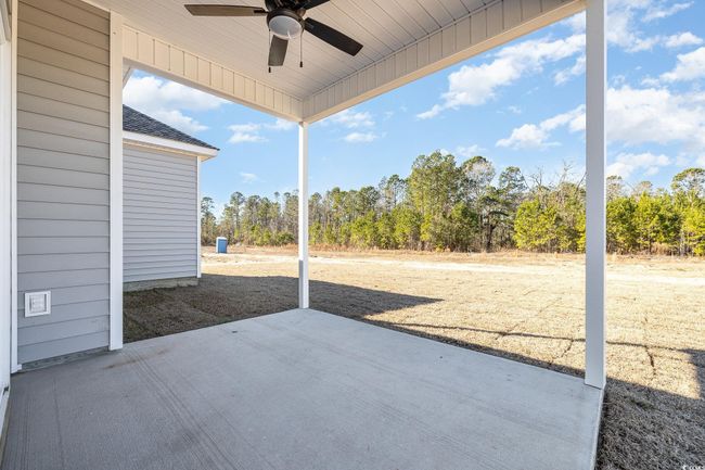 View of patio with ceiling fan | Image 27