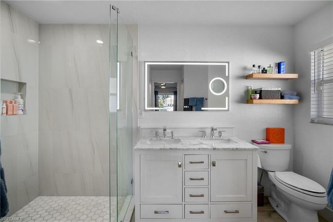 23485 Olde Meadowbrook Cir, House other with 3 bedrooms, 2 bathrooms and 2 parking in ESTERO FL | Image 24