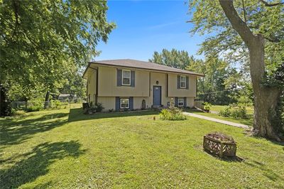 Bi-level home featuring a front yard | Image 2