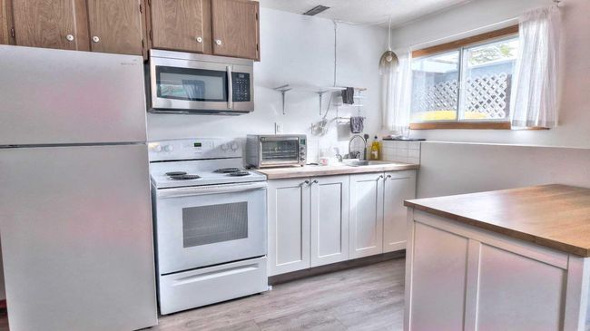 1001 9 Avenue, House other with 4 bedrooms, 2 bathrooms and 4 parking in Canmore AB | Image 27