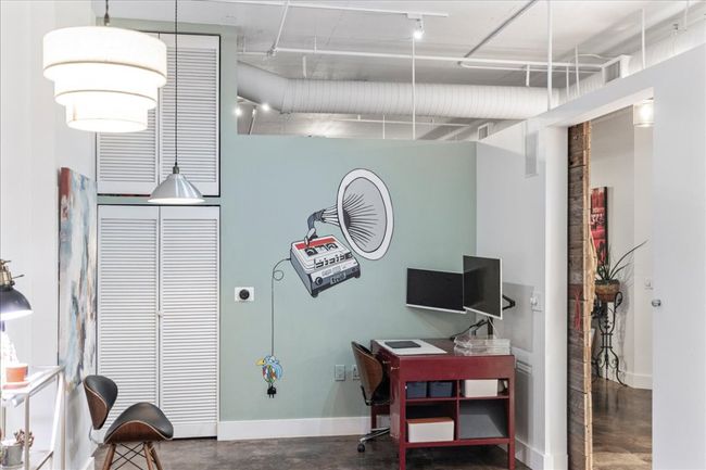 Office area featuring finished concrete flooring and baseboards | Image 20